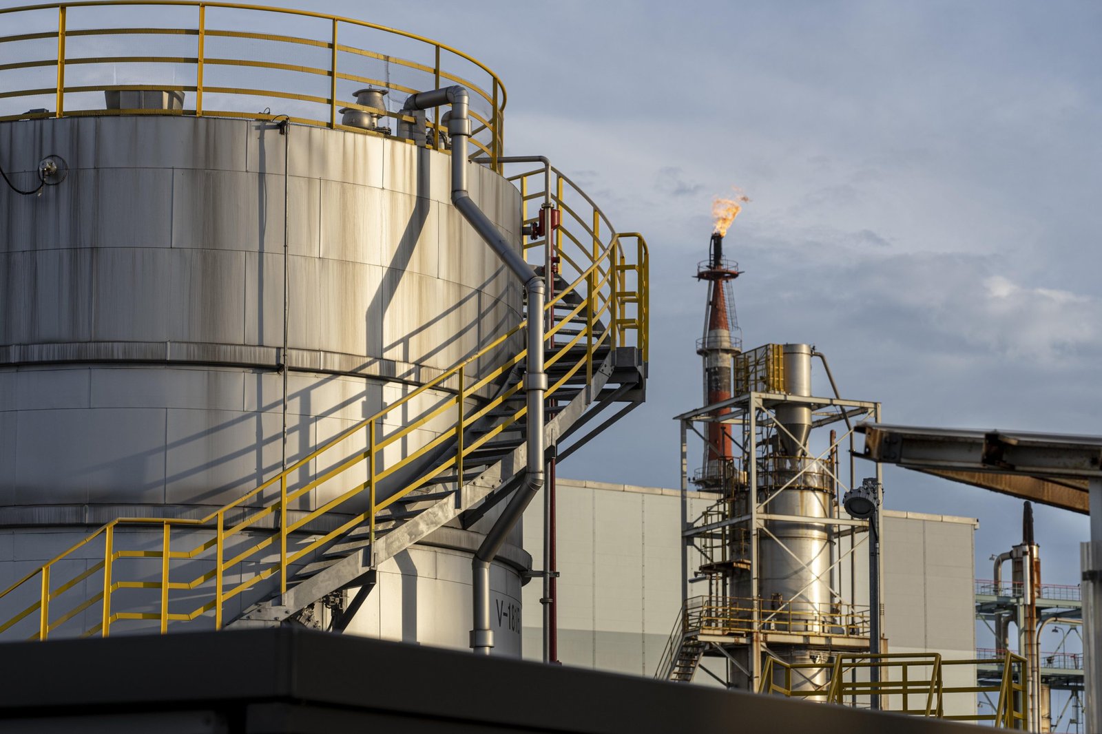 Industrial chemical plant exterior with environmental pollution management systems